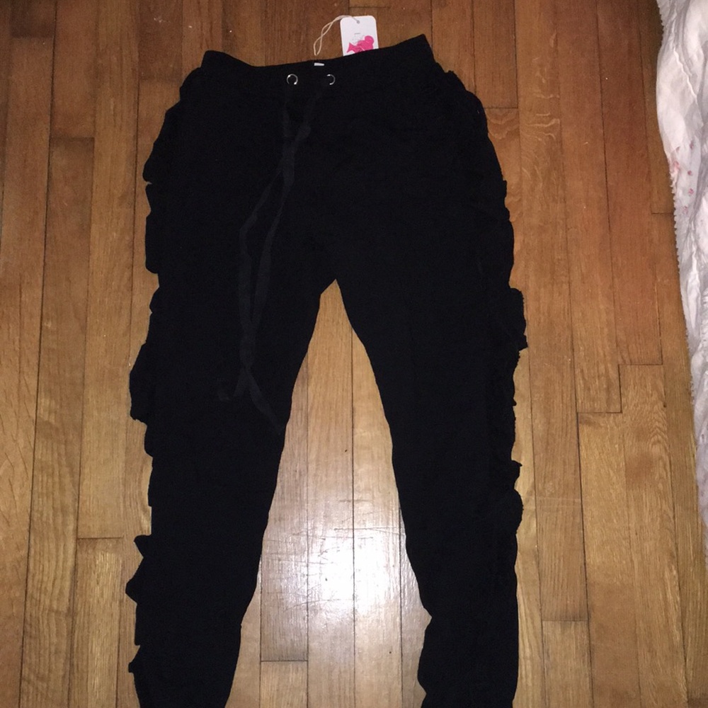 Black Ruffle Joggers from Necessary Clothing